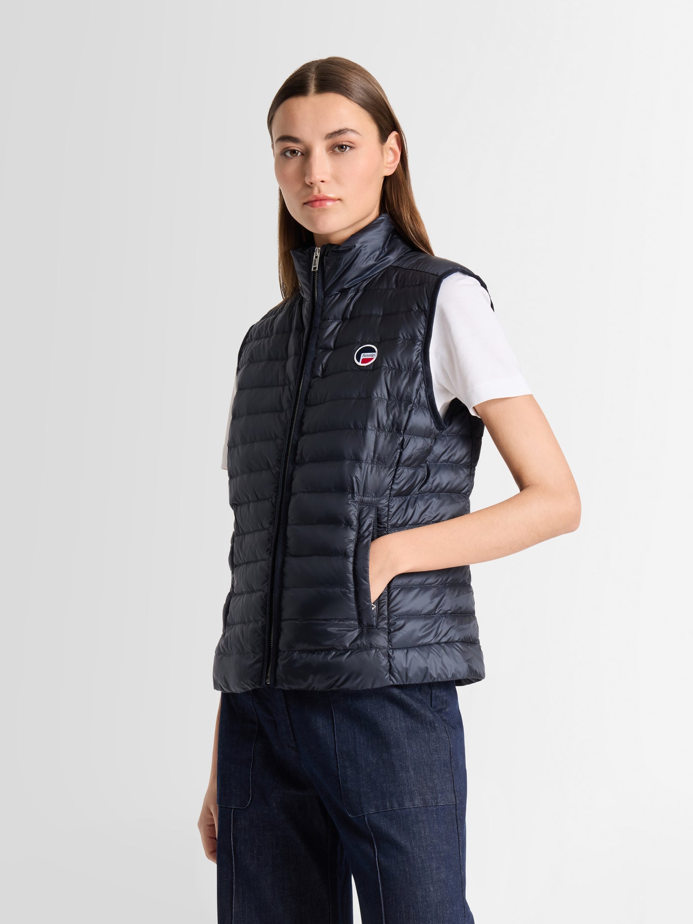NIVORA SLEEVELESS JACKET