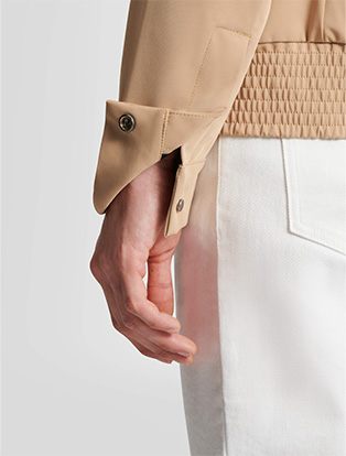 Snap adjustable cuff, elastic waistband at bottom