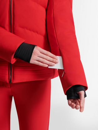 Storm cuffs with thumbhole, ski pass pocket